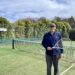 Deloraine Tennis Club Treasurer Mark Bailey standing on the tennis court