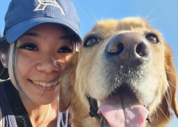Photo for North Coast Post Dr Shevonne Koh from Deloraine and Westbury Medical Practice with her golden retriever dog.
