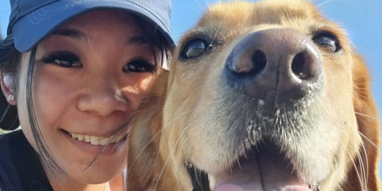 Photo for North Coast Post Dr Shevonne Koh from Deloraine and Westbury Medical Practice with her golden retriever dog.