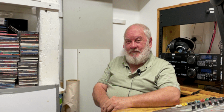 John Kenzey from Meander Valley FM at the studio desk.
