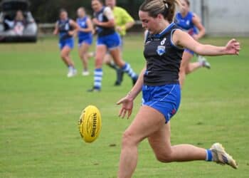Always moving: Tahlia Powe kicks forward for the Deloraine Football Club. Photo credit: Grace Close.
