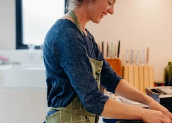 Shelduck Farm's Jessie Francis baking oat cakes in the Montana kitchen. Photo credit Jess Oakenfull