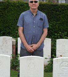 Richard Perrins at the grave of his great uncle, Lance Corporal W. Perrins, d.1918, Cambrai, France.
