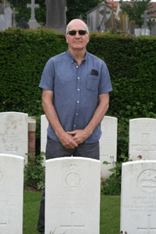 Richard Perrins at the grave of his great uncle, Lance Corporal W. Perrins, d.1918, Cambrai, France.