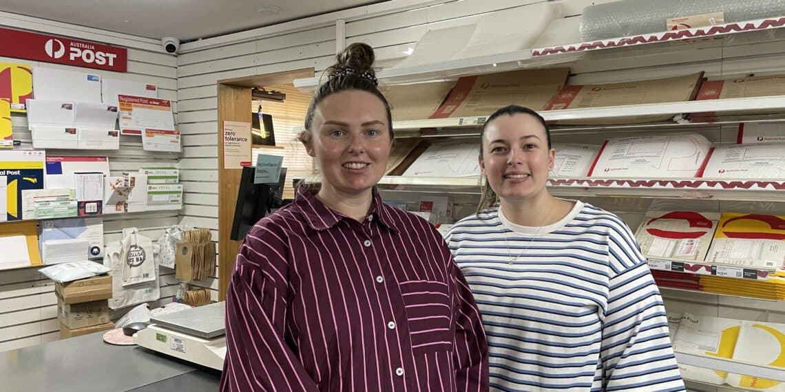 hadspen post office with Shannon and Brooke in front of the counter