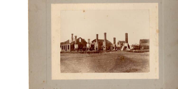 Burnt out buildings on the corner of King and William Streets, January 1902.
